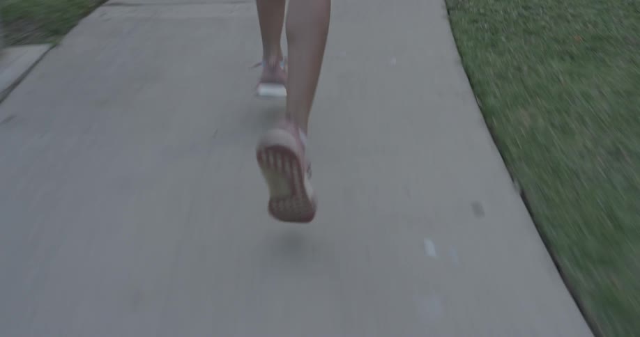 A woman on the sidewalk