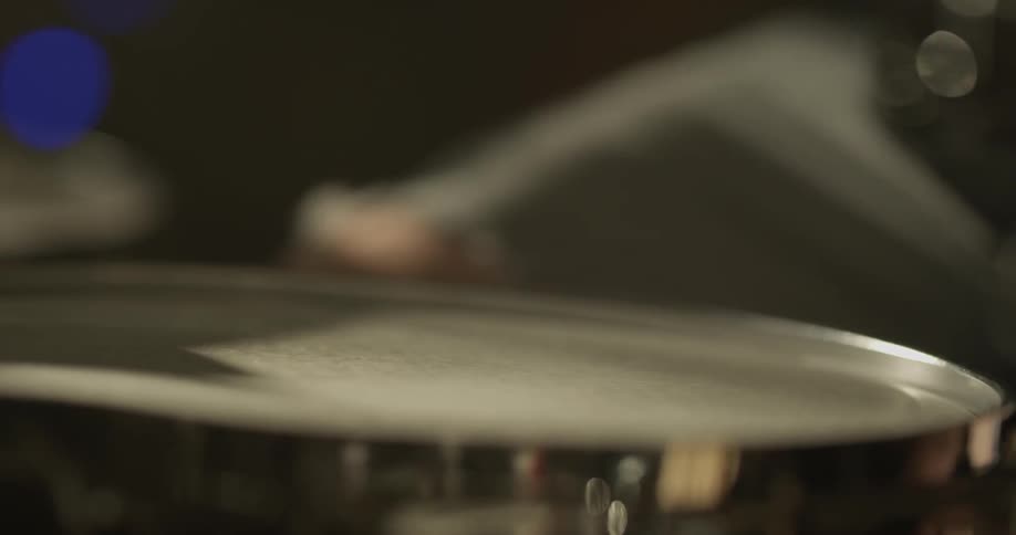 Close up of drum being played