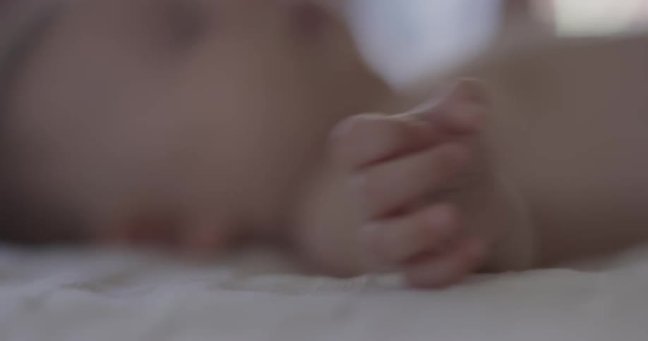 A baby is laying down