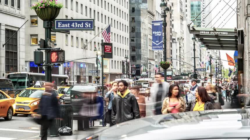 Sidewalk and street traffic in downtown of a city