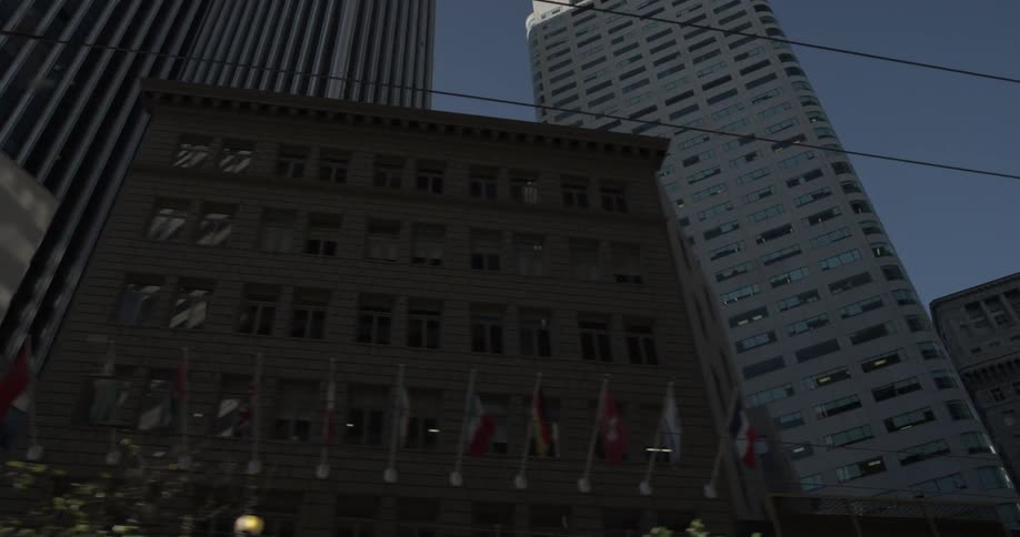 Tall city buildings tower into the sky