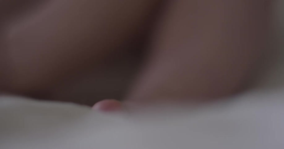 Baby hands and feet on a blanket
