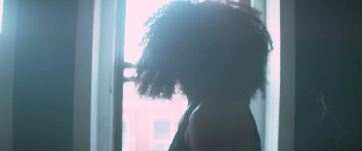 A person with curly hair