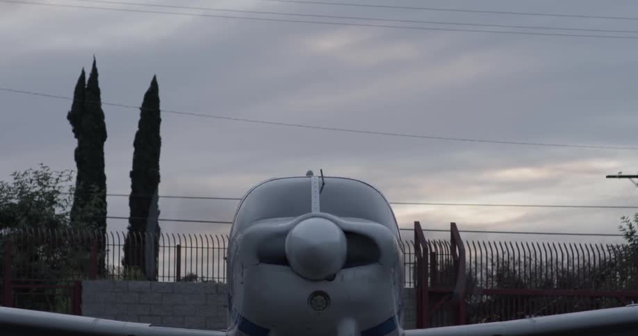 An airplane's propeller spins to a stop