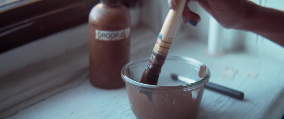 A person using a paintbrush