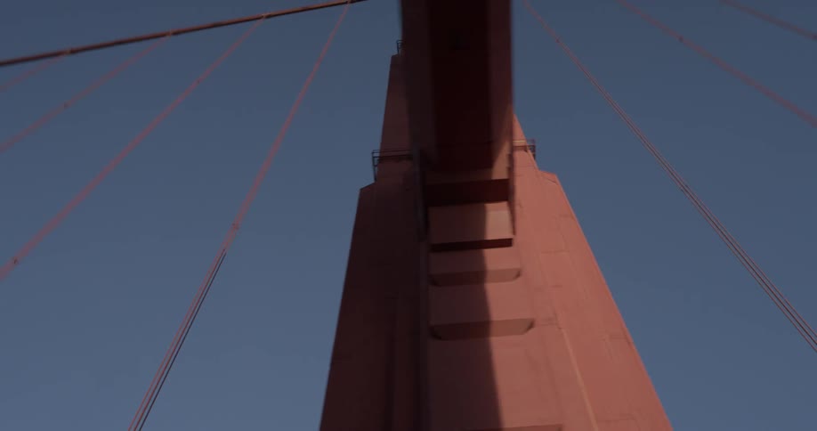 A bridge looms overhead as it is passed through