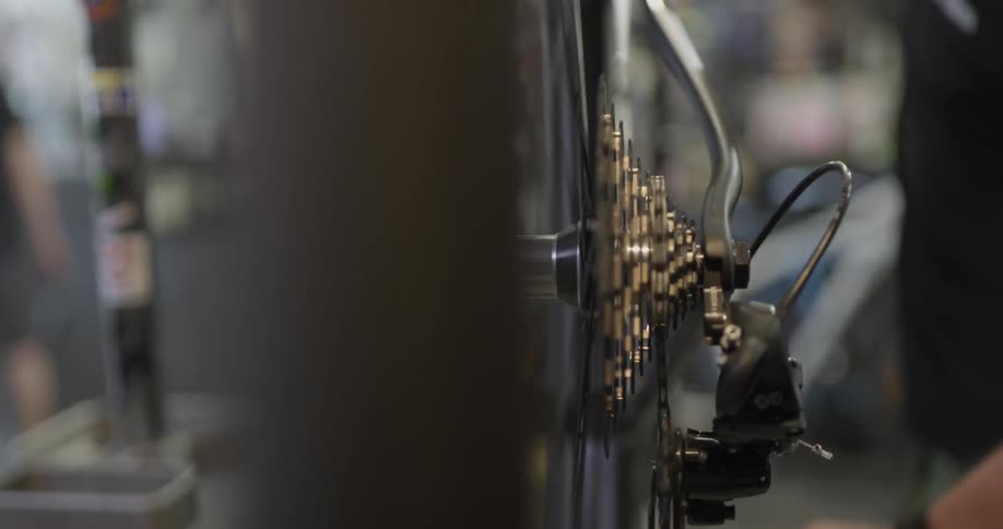Bike tire spins as its examined