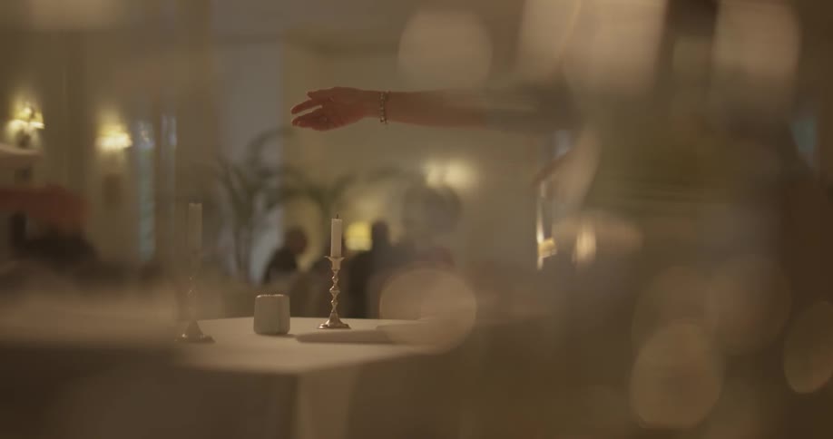 Two people set a table