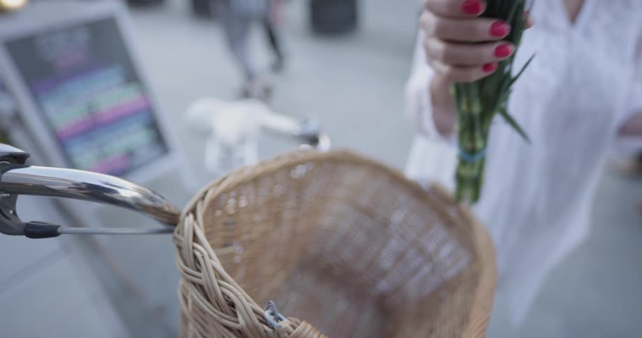 Woman Riding Bike To Coffee Shop