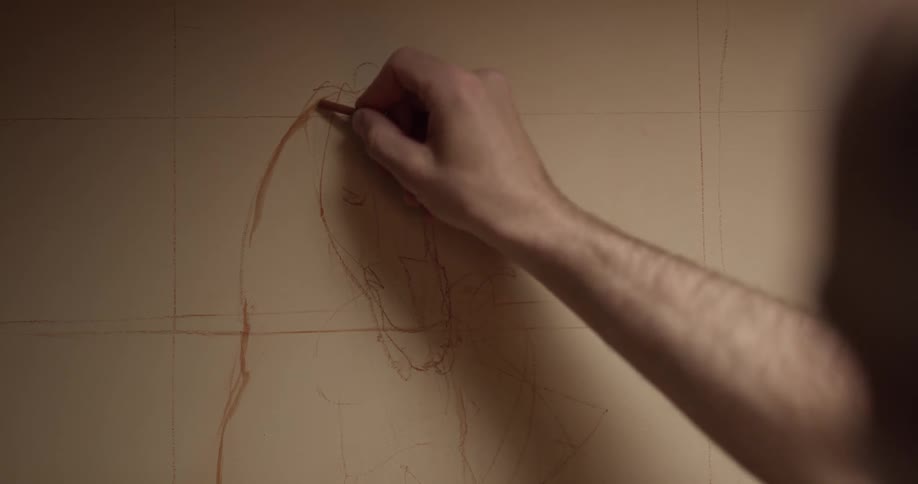 Artist sketching a horse on paper