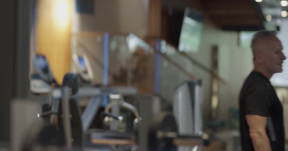 Man Working Out In Gym