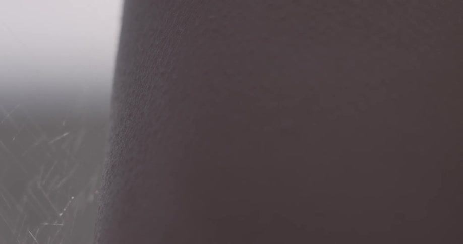 Close up of arm with water spraying around it