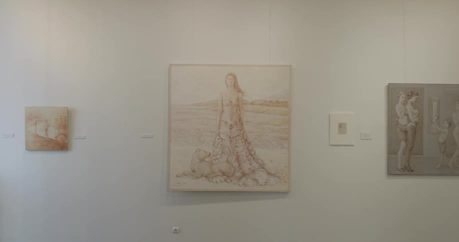 3 paintings hang on a wall