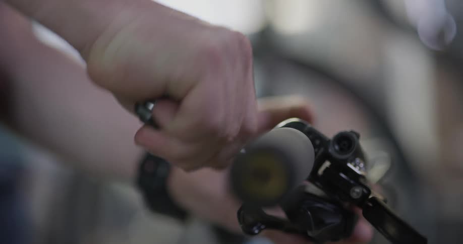 Hand screws handle onto bicycle