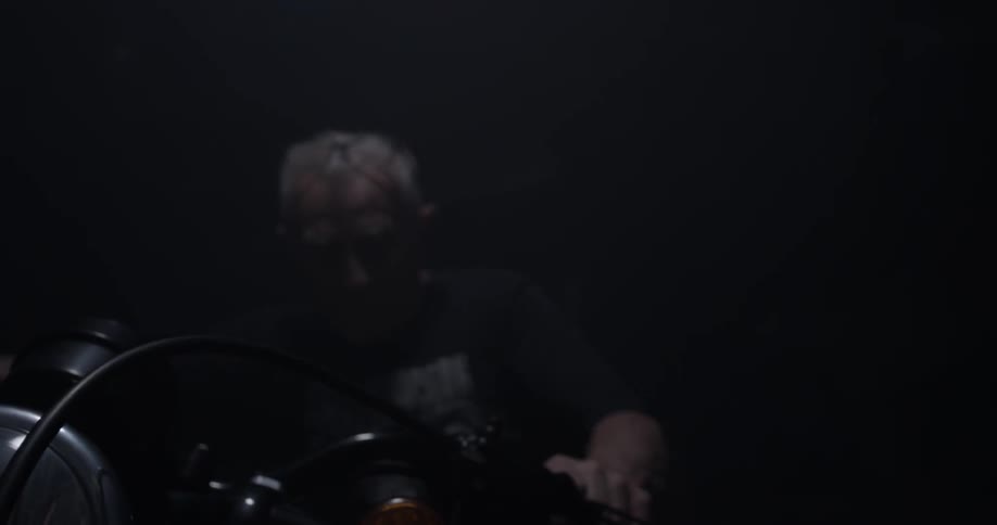 Man Working On A Motorcycle