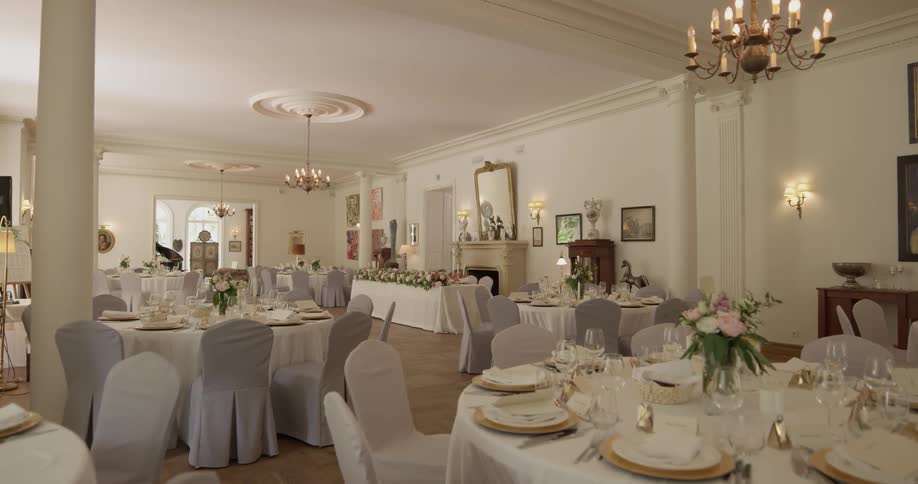 A room full of decorated dinner tables