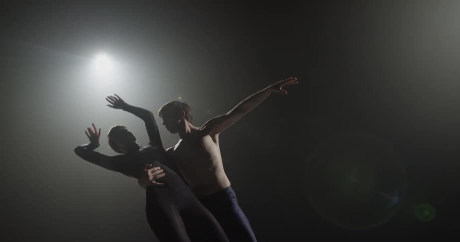 A man and a woman dancing in a contemporary fashion