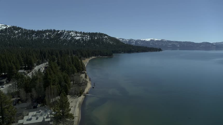 An overview of a beautiful mountain near water