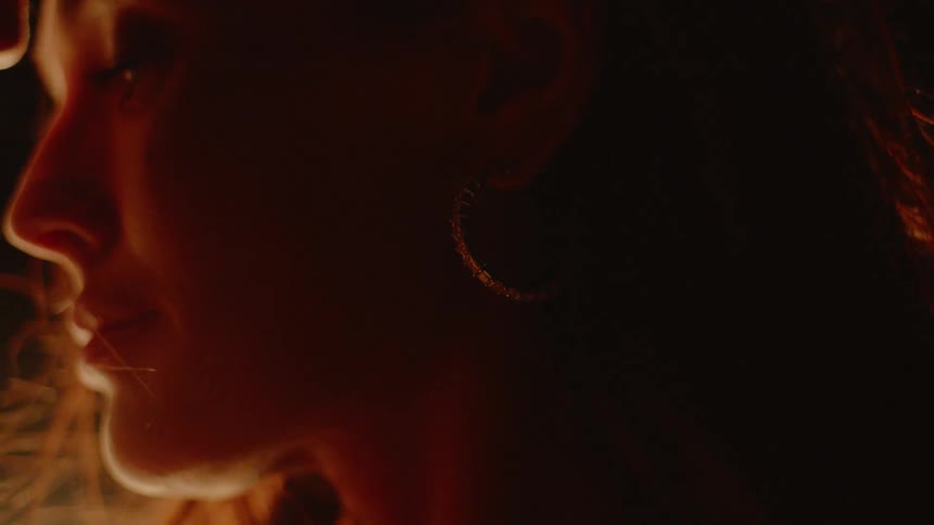 Couple Kissing By Fire In Desert