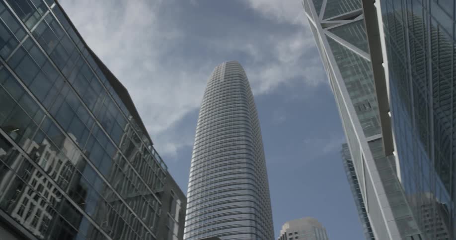 The viewer looks up to see office windows everywhere while turning left