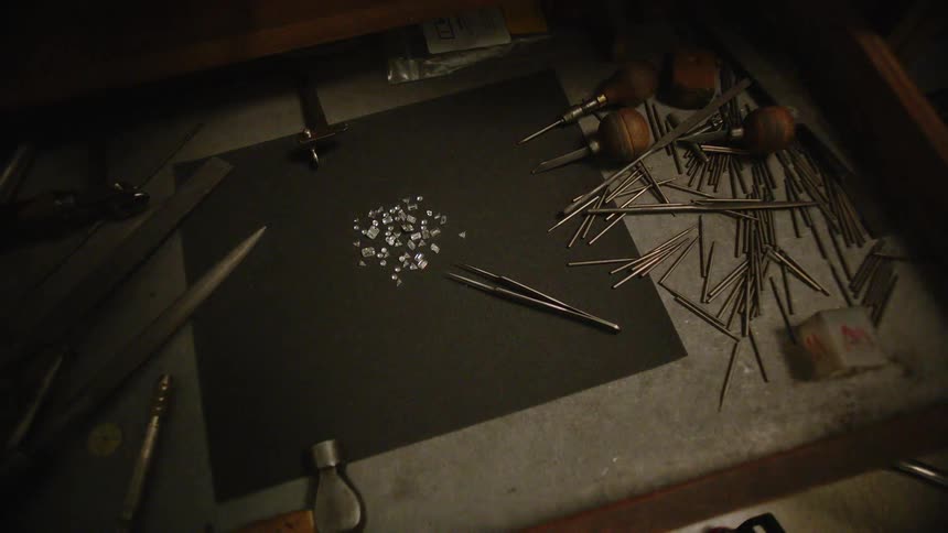 Diamonds and tools are placed on a table