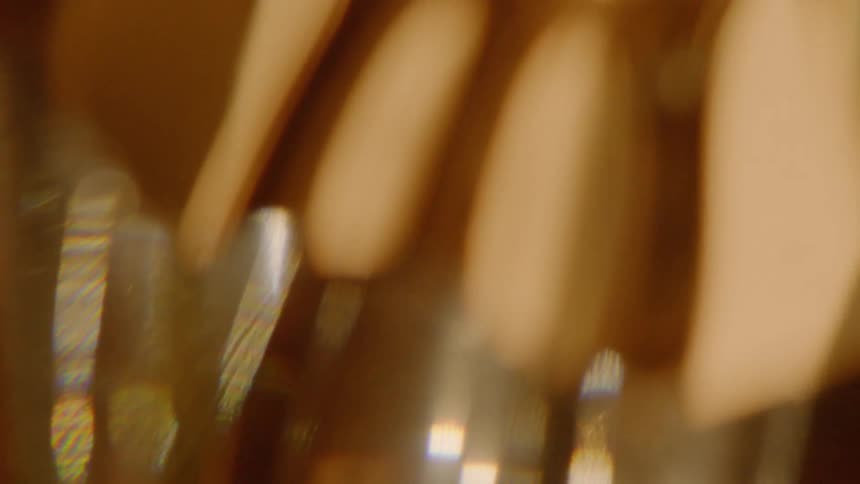Light shines from a reflective surface