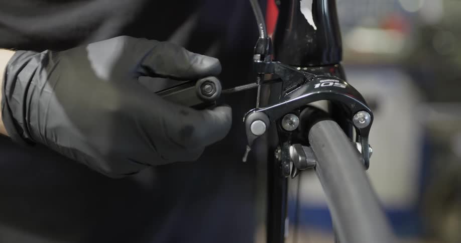 Man works on bicycle