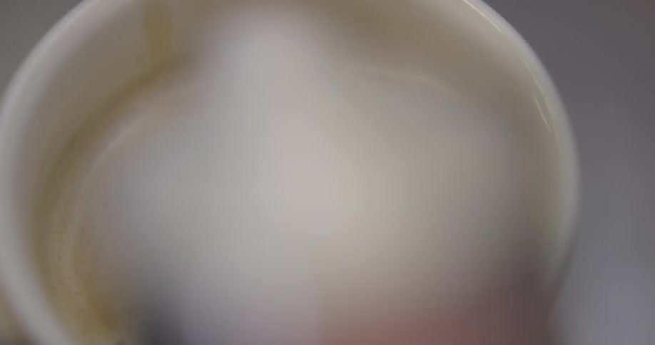 Liquid is being poured into a cup