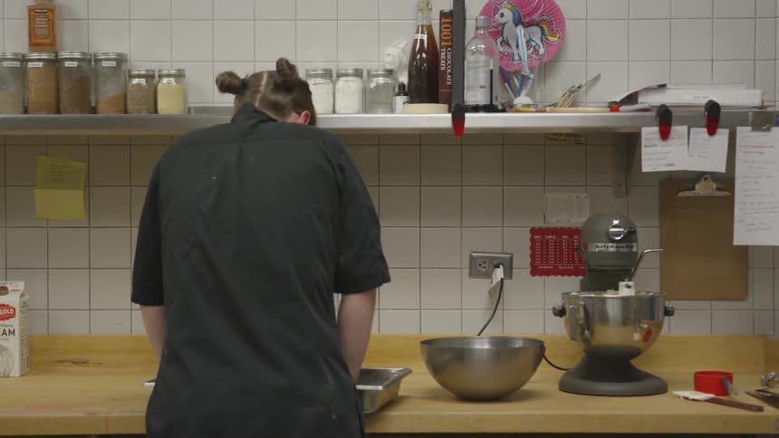 Woman making food in a kitchen