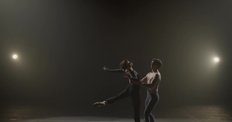 A man and woman are dancing together