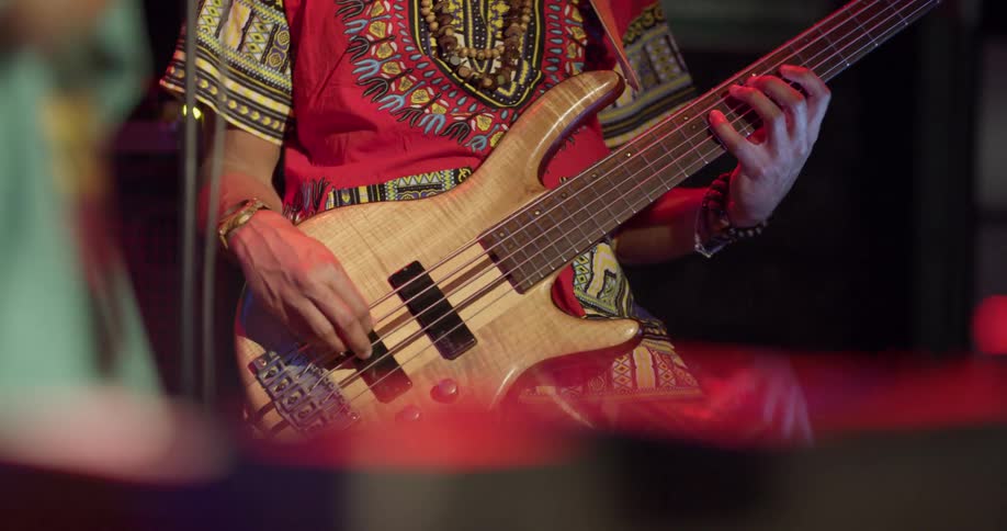 Guitar is played at a venue