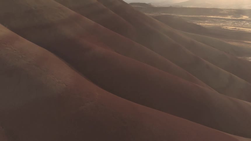 Smooth rocky mountains that are in the desert