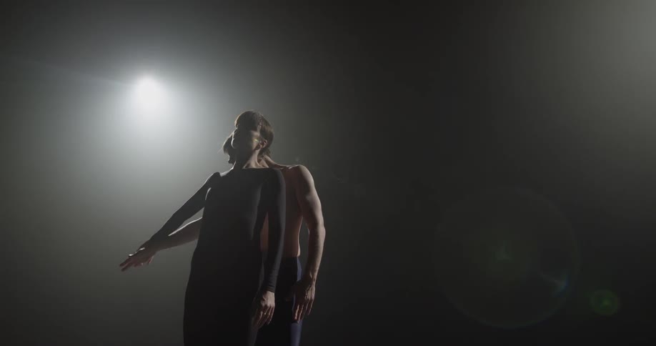 A man and woman dance together