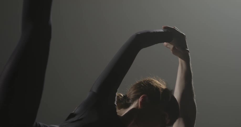 Flexible female dancer with her male partner