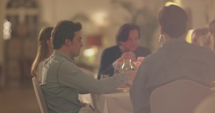 Family Eating Fancy Dinner