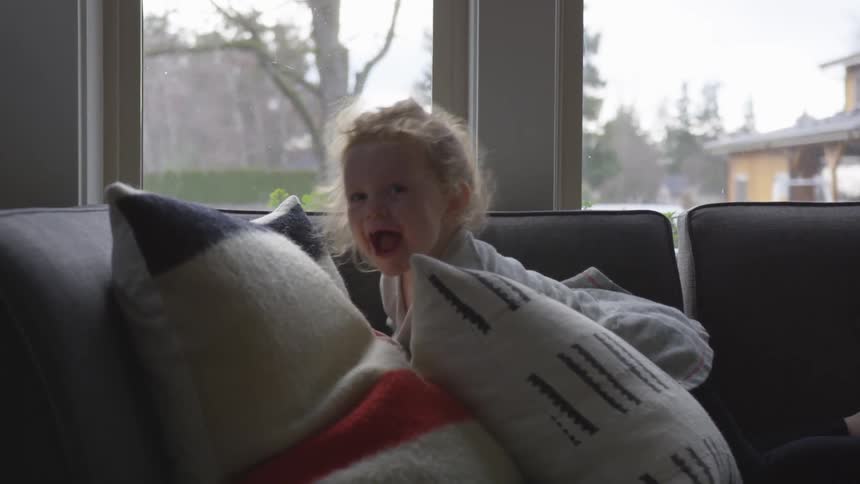 Father And Daughter Playing At Home