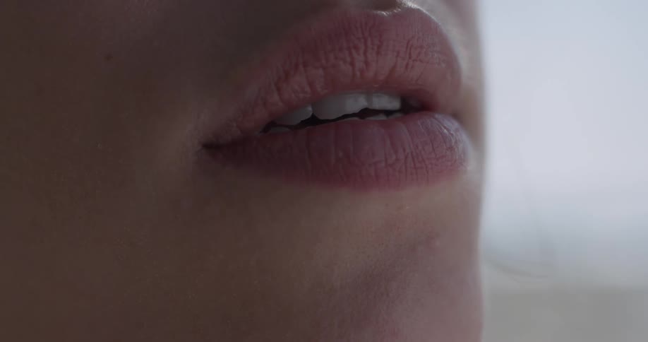 Woman parts her lips
