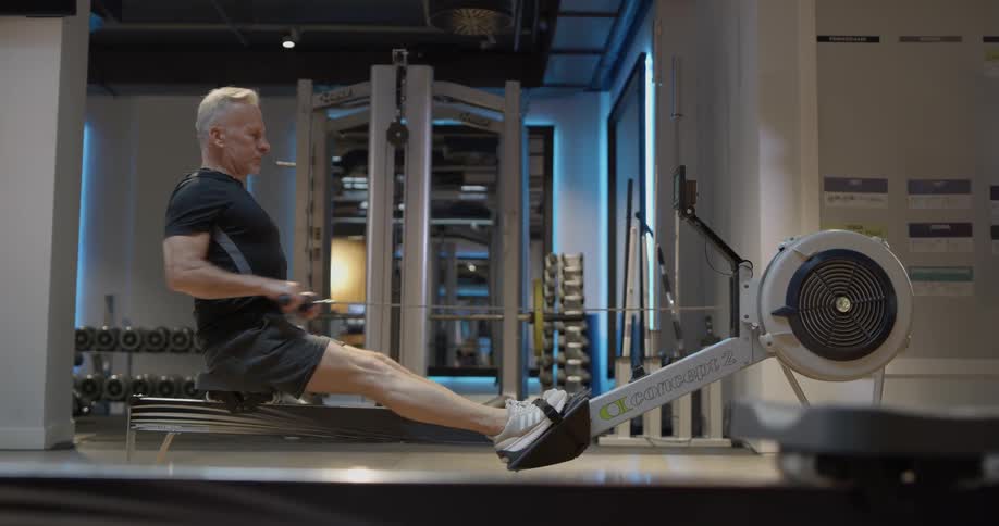 A man is working out on a machine