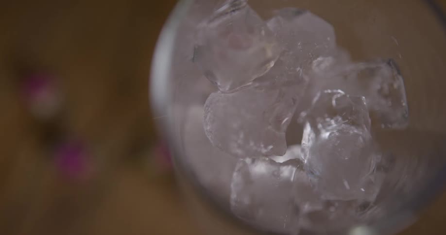 Liquids are poured into a cup of ice