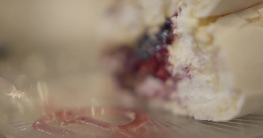 Cake is being put on a dish
