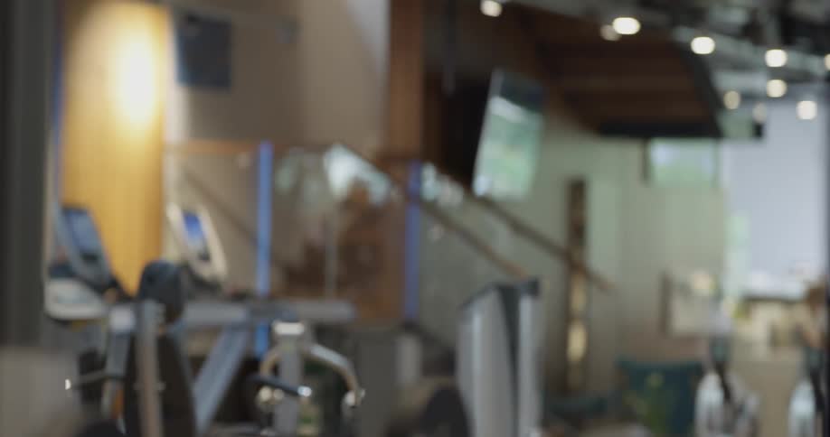 Man walks across gym