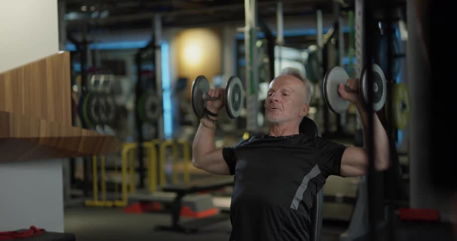 A man is working out at a gym