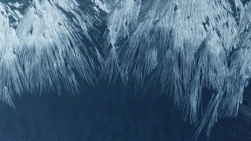 Ice forming on a piece of glass