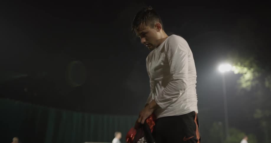 A group of men playing soccer together
