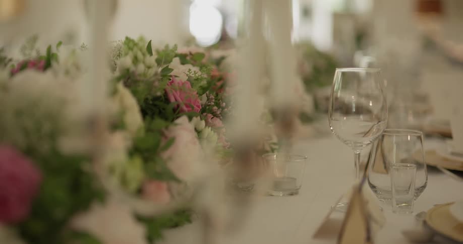 A table that is set with wine glasses