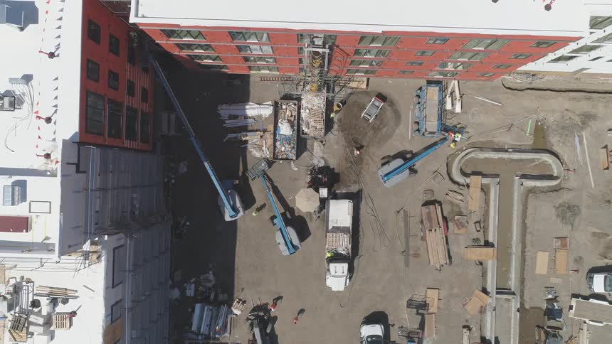 People are working at a construction site