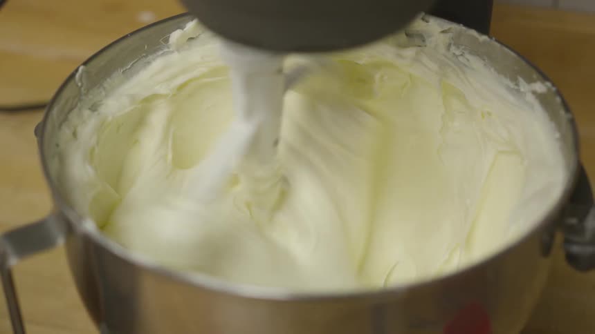 Ingredients are getting mixed in a bowl