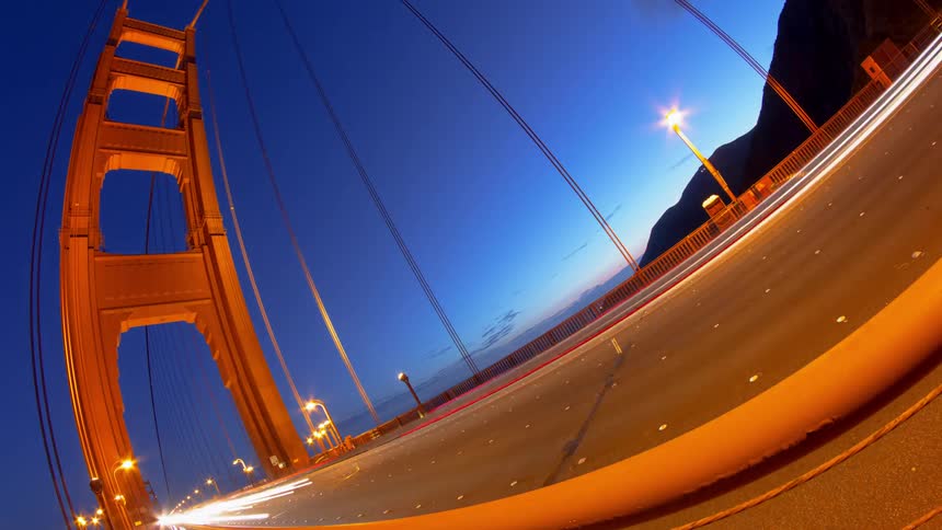 Cars are driving on the bridge