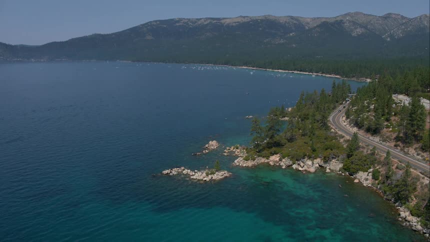 Large lake of water surrounded by mountains