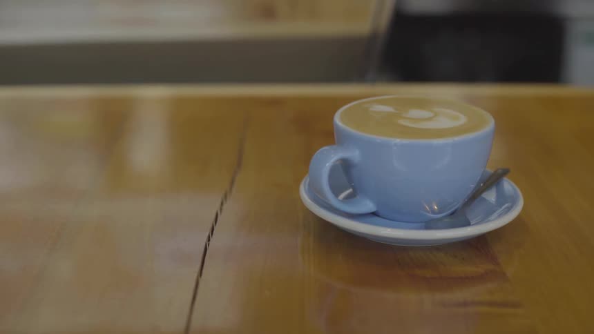 A cup is placed on a table